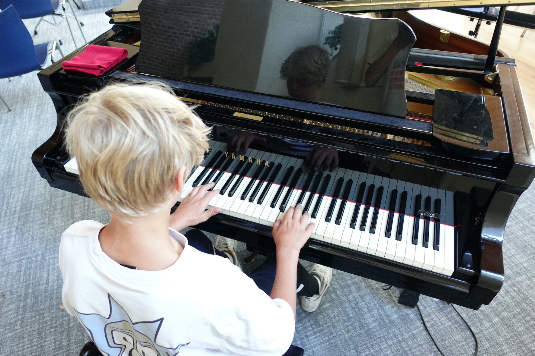 Pianoles op locatie.JPG