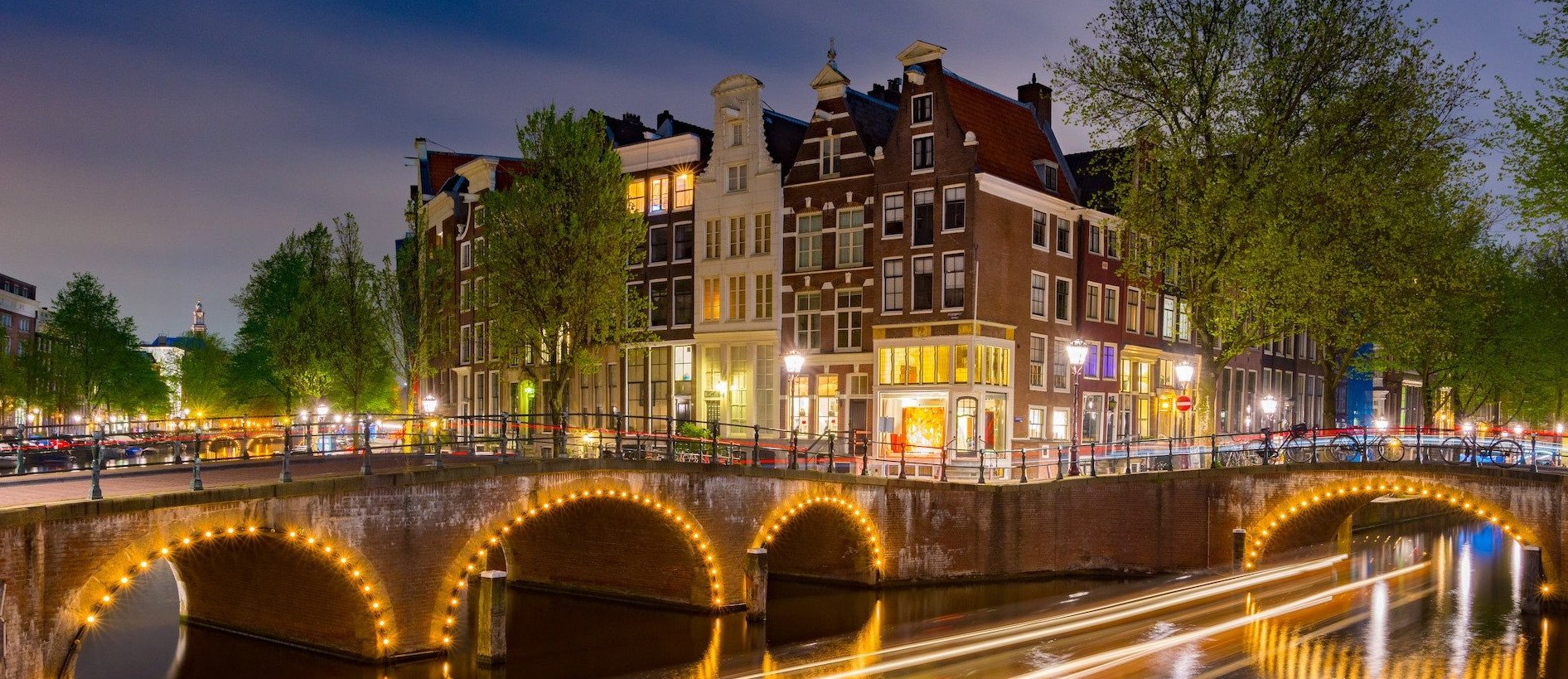 Huizen amsterdamse gracht - Foto door Andrew Hawkes